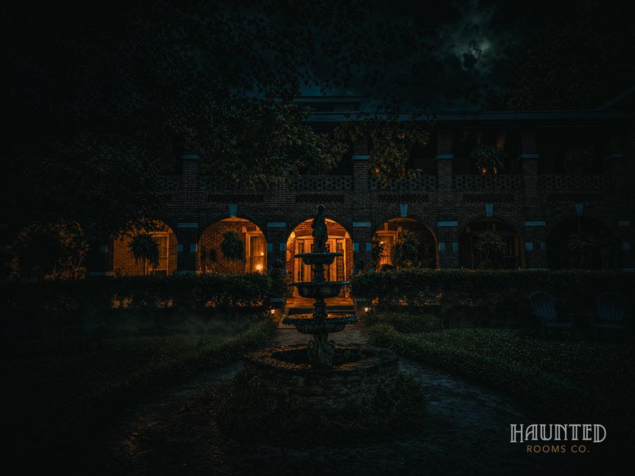Fountain in the Thomas House Hotel courtyard at night