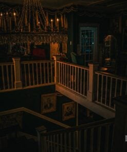 Grand staircase and chandelier inside the Thomas House Hotel