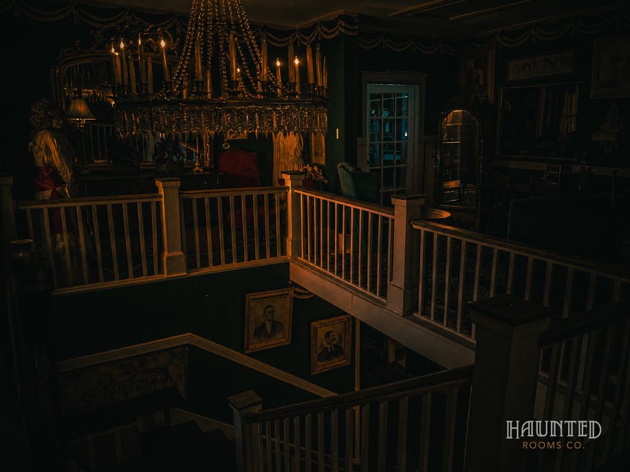 Grand staircase and chandelier inside the Thomas House Hotel