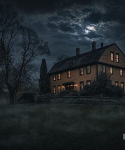 Captain Grant's 1754 gambrel-roof inn on its rise at night with mist
