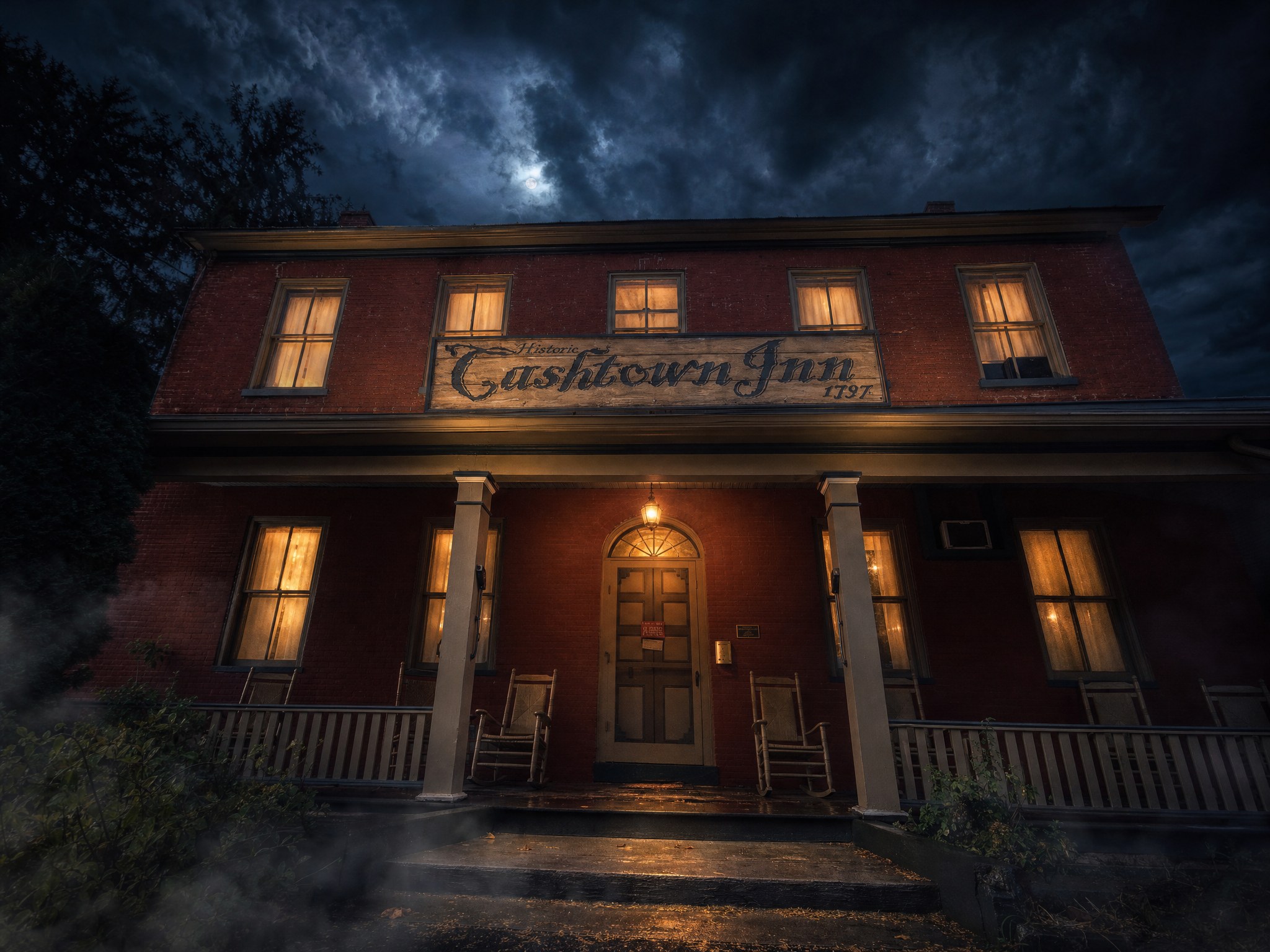 Looking up at the front door of the Cashtown Inn at night