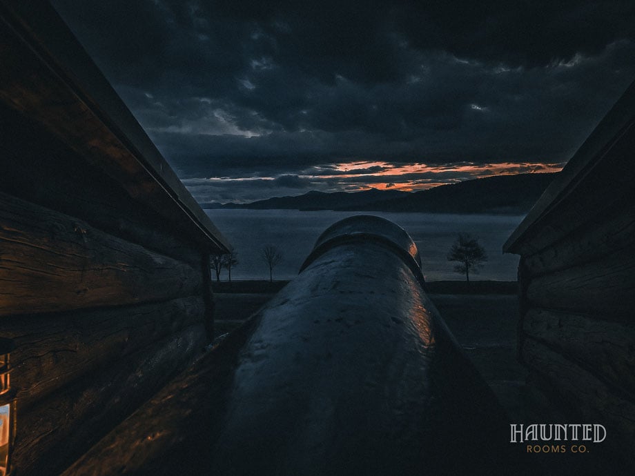 Cannon aimed over Lake George from Fort William Henry at dusk