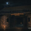 Moonlit stone gate of Fort William Henry with the 1755-1757 sign