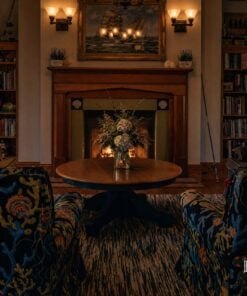 Lobby and fireplace of the Roanoke Island Inn at night