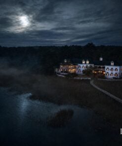 Aerial view of the Roanoke Island Inn at night on the edge of the marsh, Manteo, North Carolina
